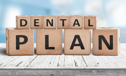 Blocks spell “dental plan”