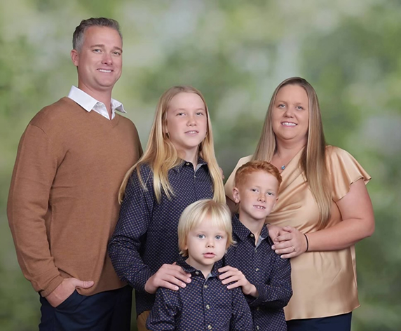 Big Pine Key Florida dentist Amanda Cobb D M D with her family outdoors